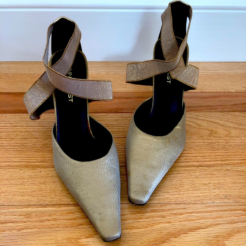 New Nine West dress shoes in gold. 3” heel. Elastic ankle strap. Spots near toe